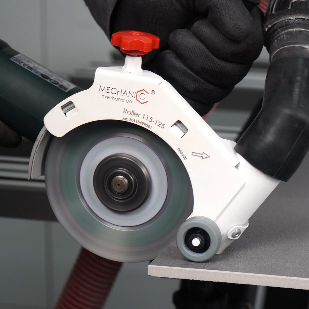 Distar MECHANIC roller guiding angle grinder during 45 degree tile cut