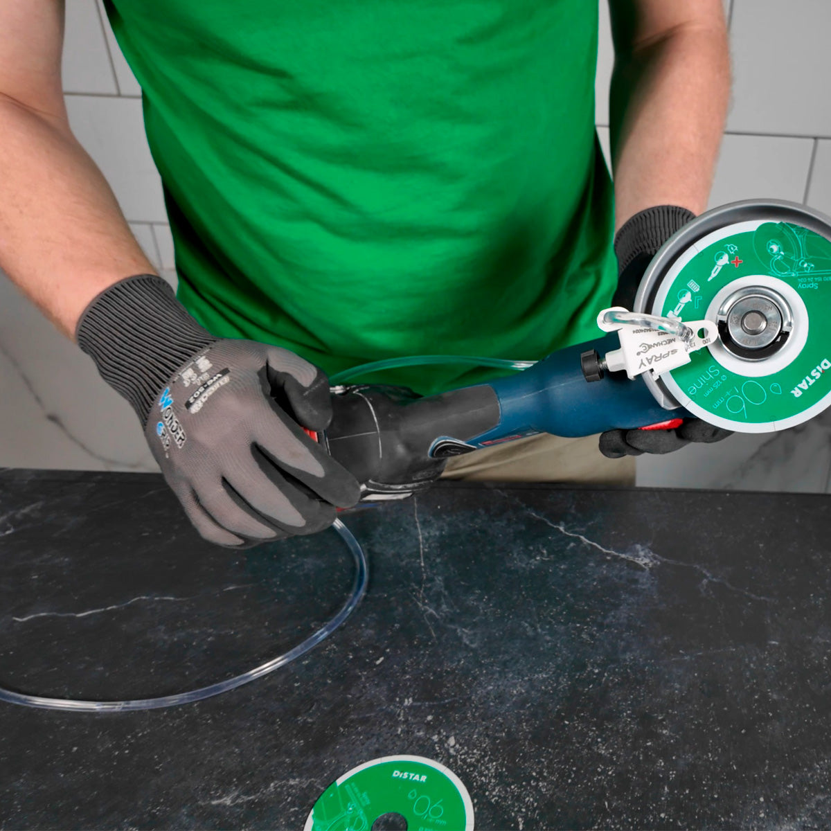 Distar SPRAY water cooling system used during tile cutting with angle grinder